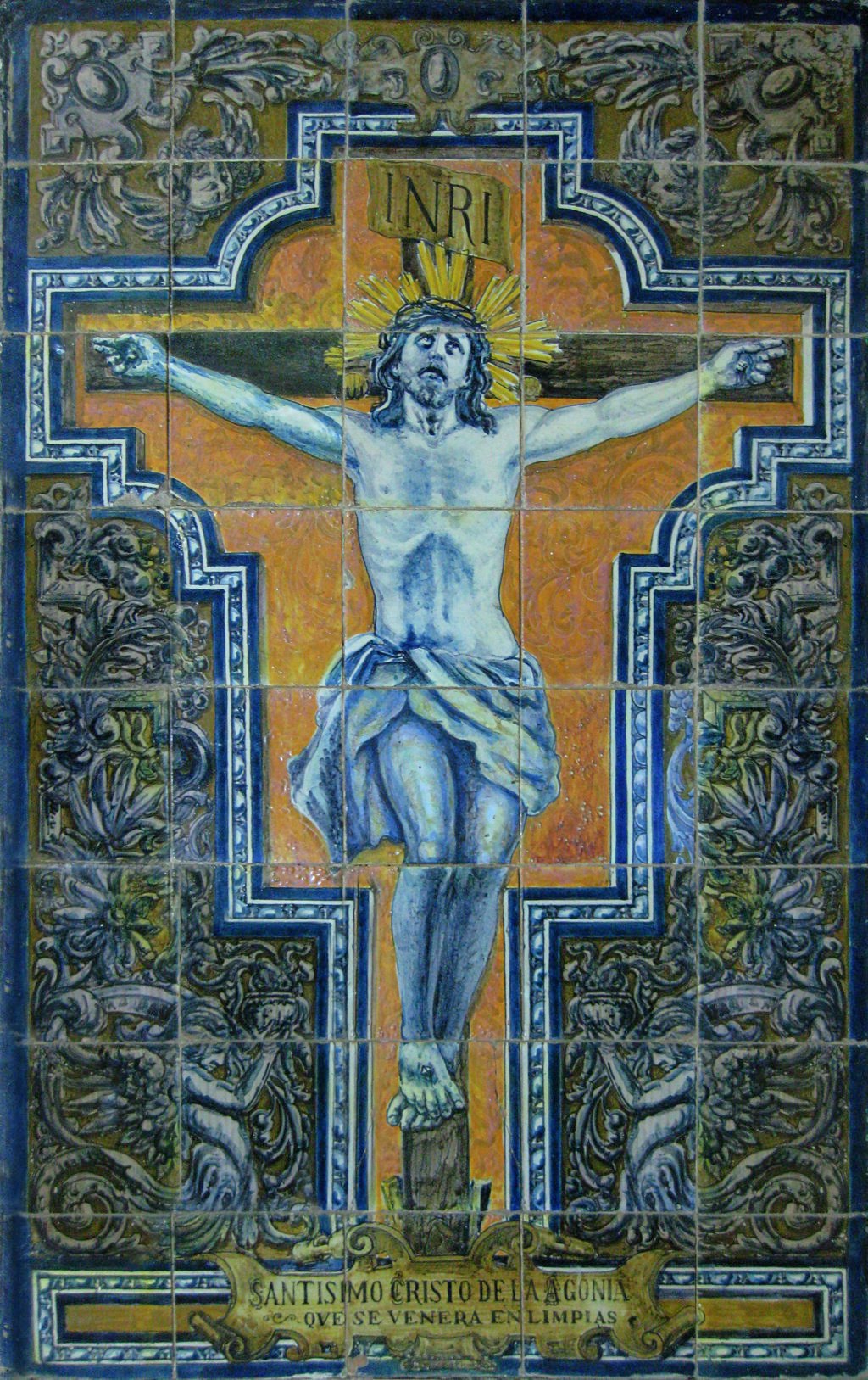 00549. Retablo cerámico. Cristo de la Agonía de Limpias. Alcalá de Guadaíra. Sevilla.