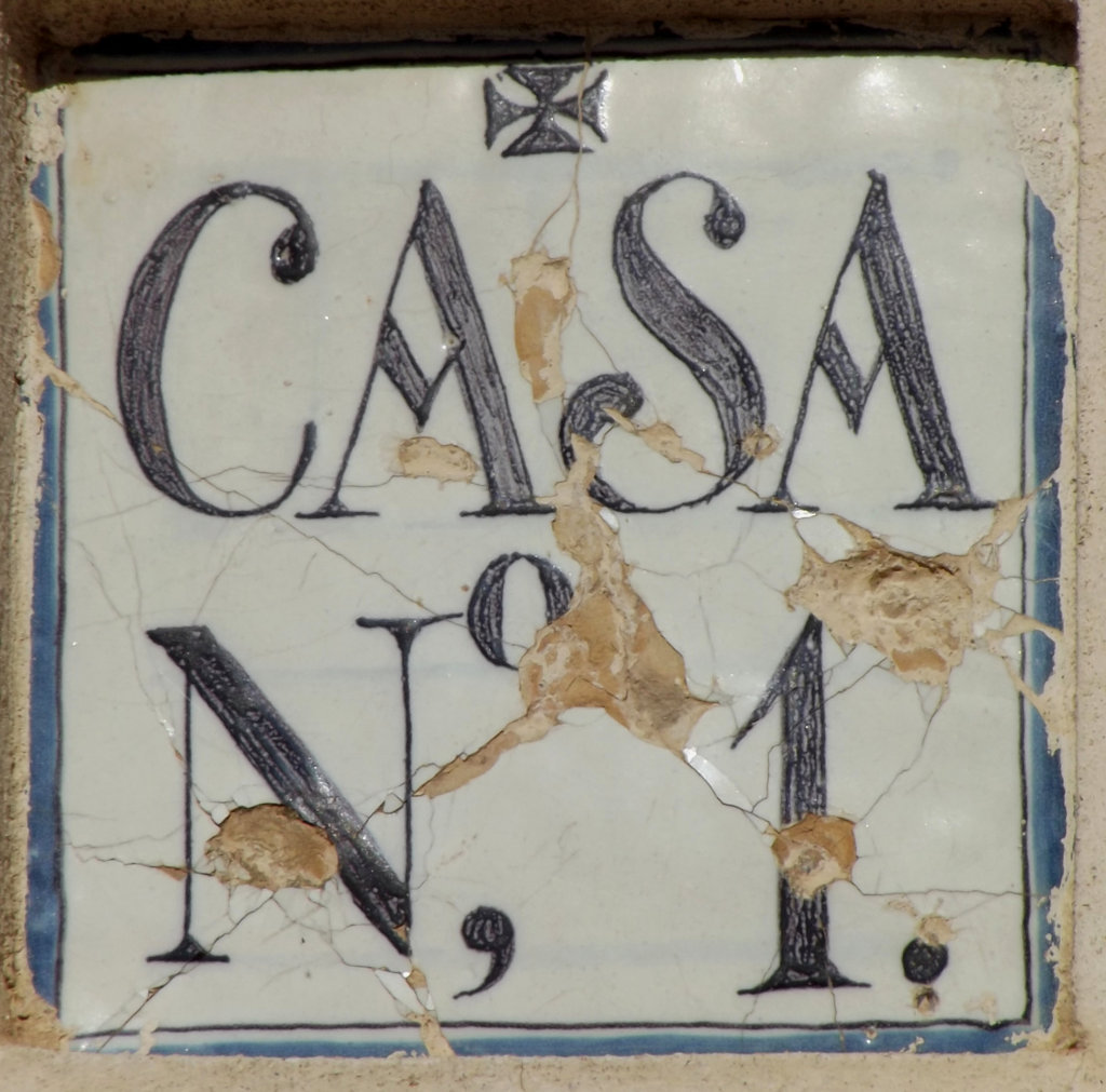00611. Placa de Olavide. Número de casa. Antiguo Monasterio de la Cartuja. Sevilla.