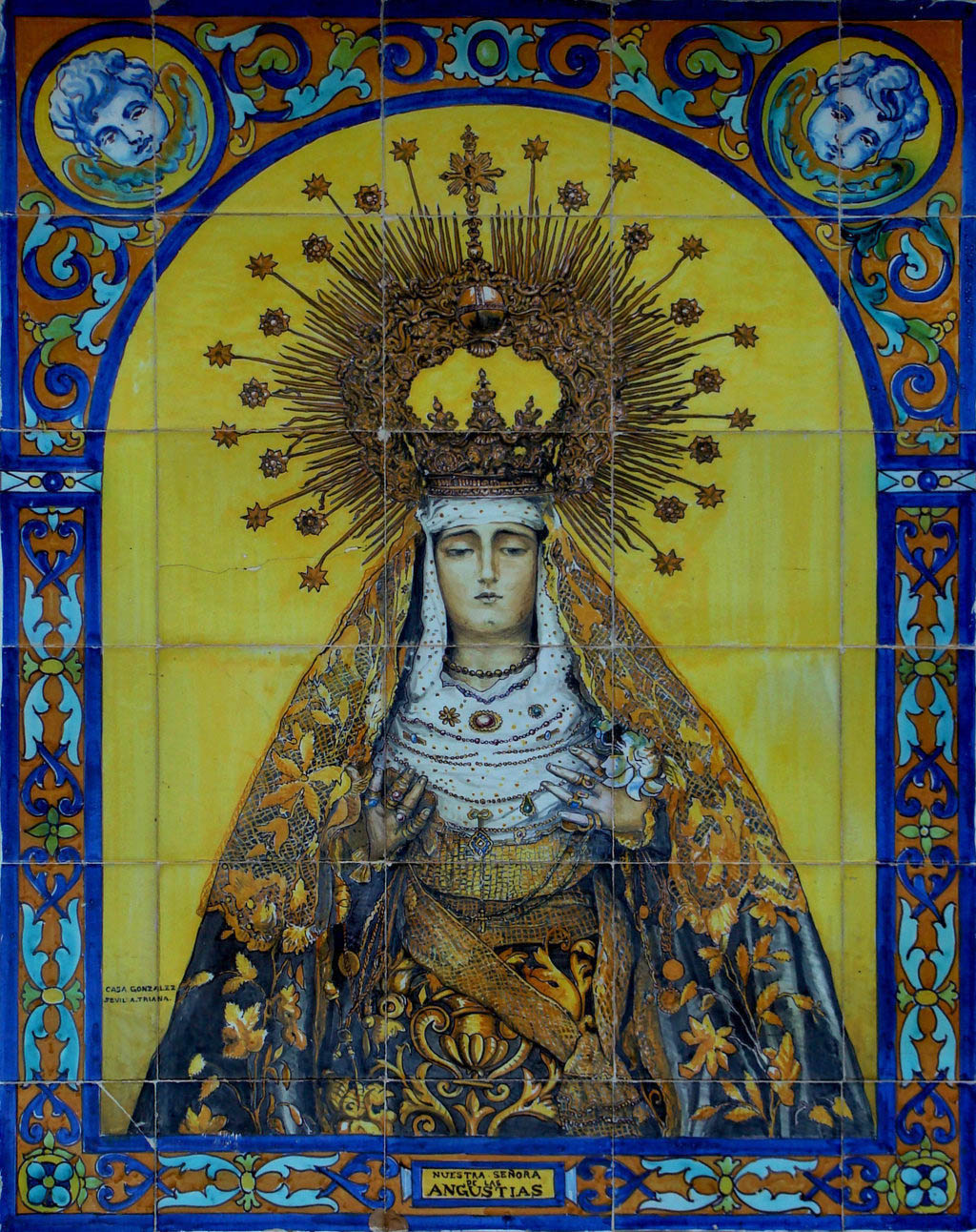 03003. Retablo cerámico. Virgen de las Angustias. Alcalá del Río. Sevilla.