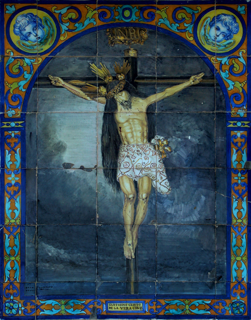 03004. Retablo cerámico. Cristo de la Vera Cruz. Alcalá del Río. Sevilla.